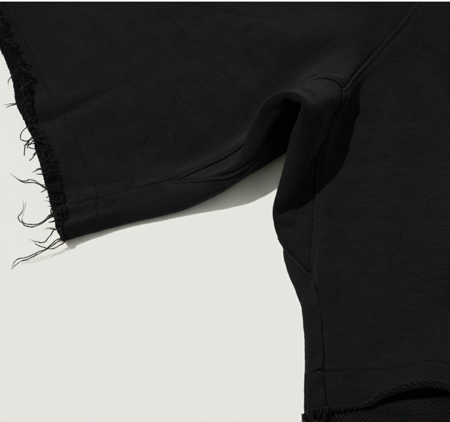 Baggy Shorts with Raw Hem - Illuminati White Logo